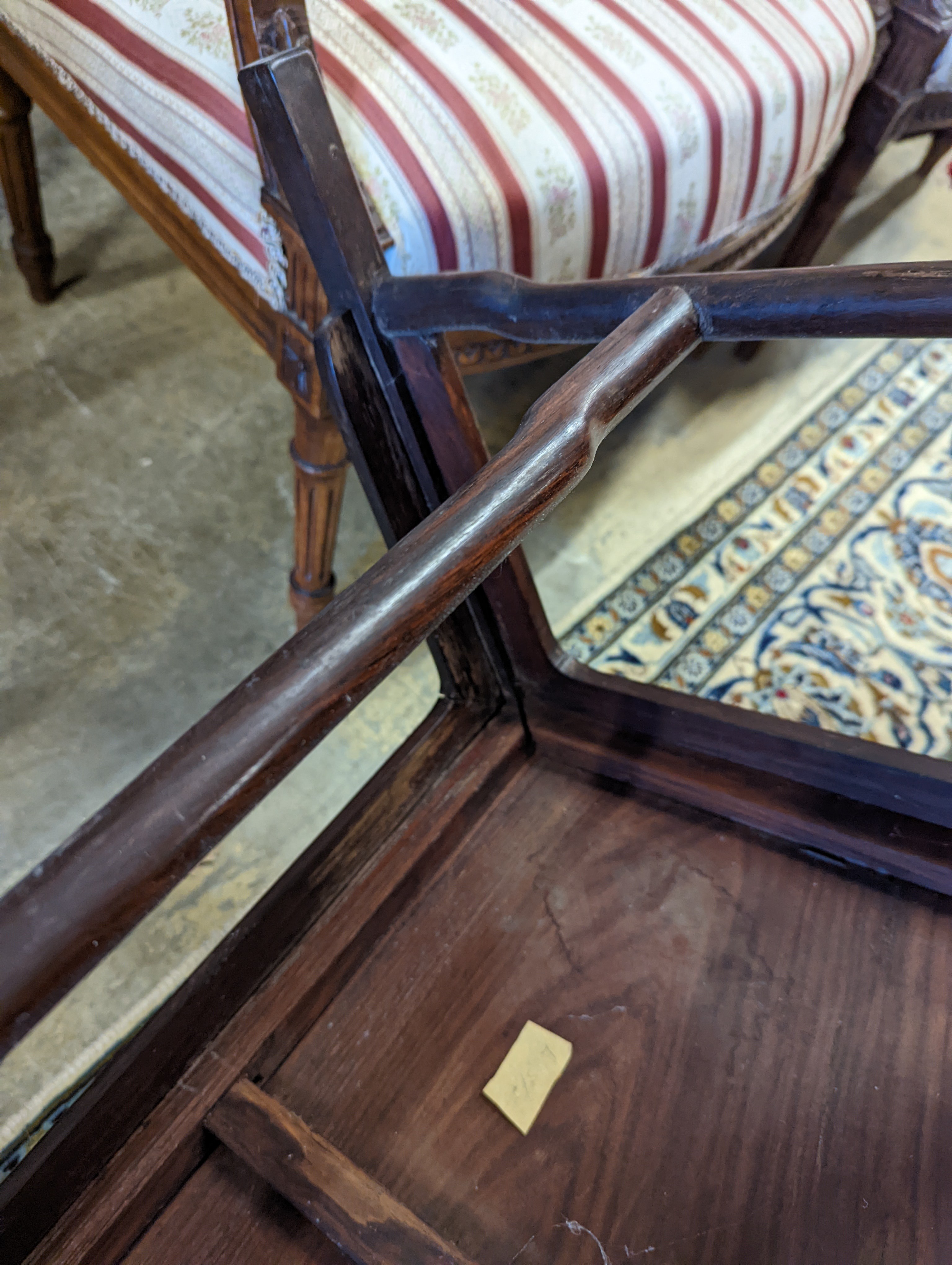 A pair of mid 20th century Chinese Hongmu elbow chairs with cushion seats, width 58cm, depth 49cm, height 92cm
